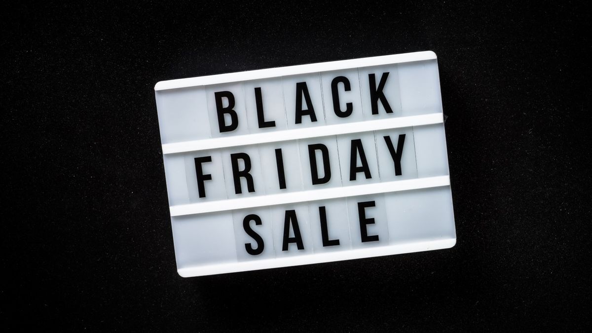 Black friday sale concept at black background. Top view.
