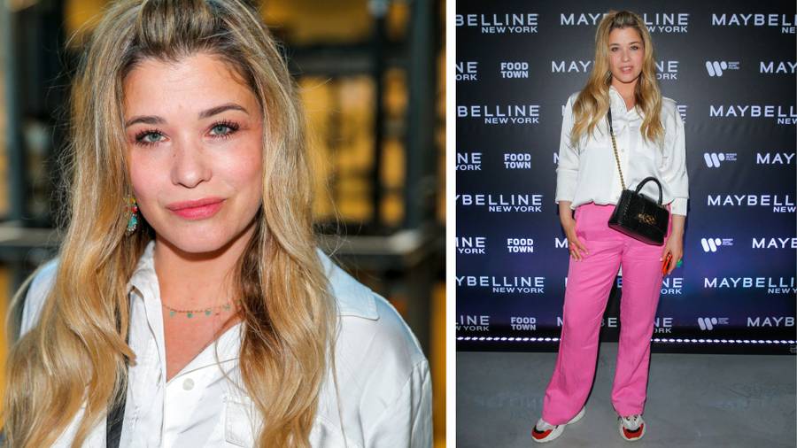 Impreza Maybelline New York. Wersow podkreśla powiększony biust, a Kaczorowska w tym garniturze wygląda BOSKO