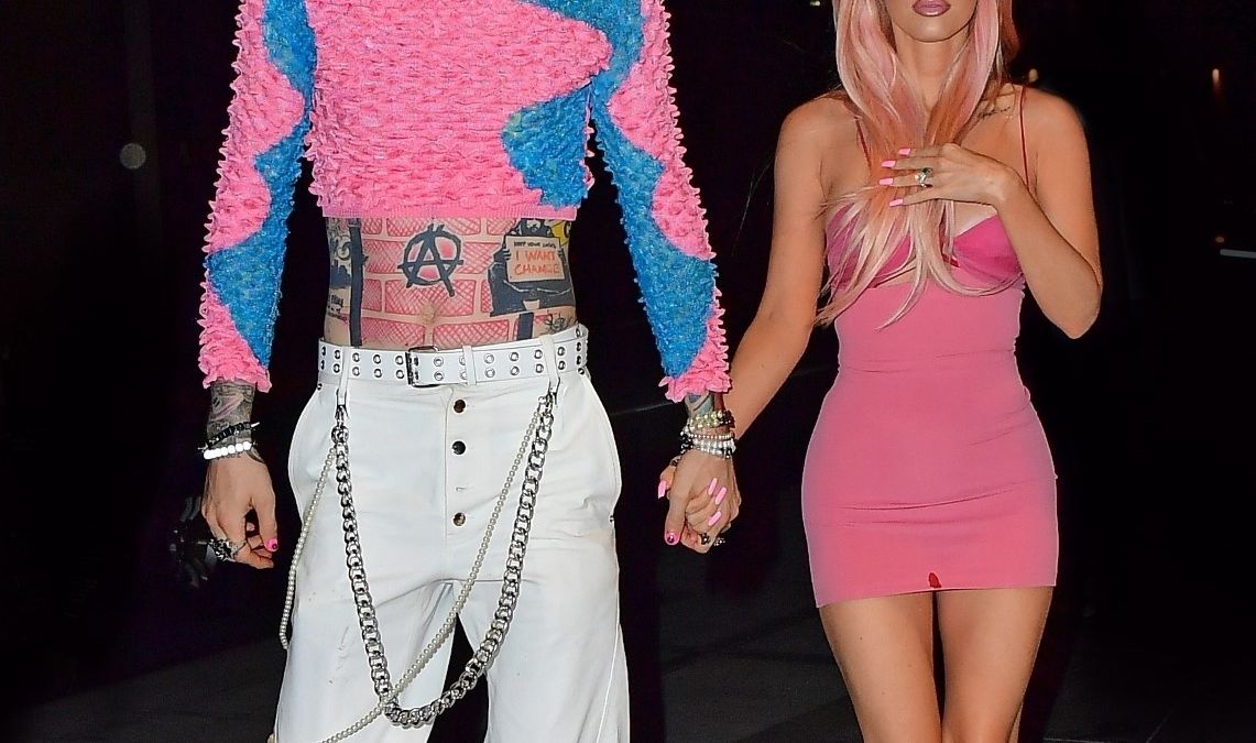 New York, NY - Megan Fox and Machine Gun Kelly walk hand in hand as they step out for dinner in New York. The two both rocked Barbie pink as MGK's hair matched Megan's dress. BACKGRID USA 27 JUNE 2022,Image: 703420414, License: Rights-managed, Restrictions: Please do not change lead image, Model Release: no, Pictured: Megan Fox, Machine Gun Kelly, MGK, Credit line: PapCulture / BACKGRID / Backgrid USA / Forum