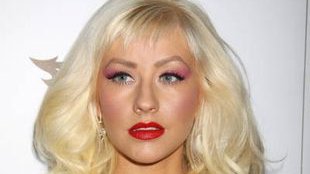 Christina Aguilera baluje topless