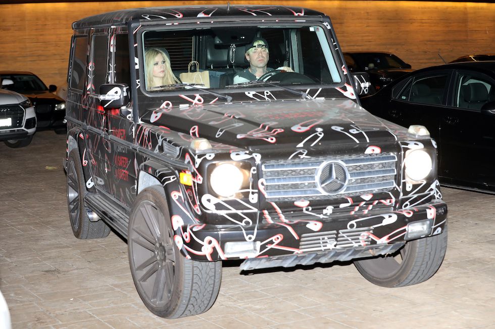 PREMIUM EXCLUSIVE Please contact X17 before any use of these exclusive photos - Friday, November 12, 2021 - Avril Lavigne lets her punky style shine through after dying the tips of her flowing blonde locks fiery red. The Canadian rocker also rocks a pair of sexy cut out lace up pants as she walks side by side with her boyfriend Mod Sun.,Image: 643282891, License: Rights-managed, Restrictions: , Model Release: no, Credit line: X17online.com / X17 / Forum