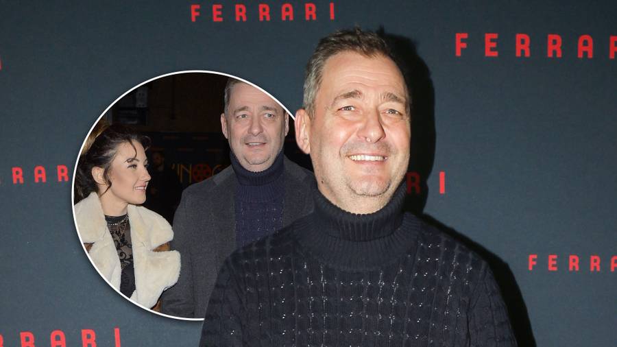 Jacek Rozenek z NOWĄ PARTNERKĄ o zachwycających nogach bryluje na premierze filmu (ZDJĘCIA)