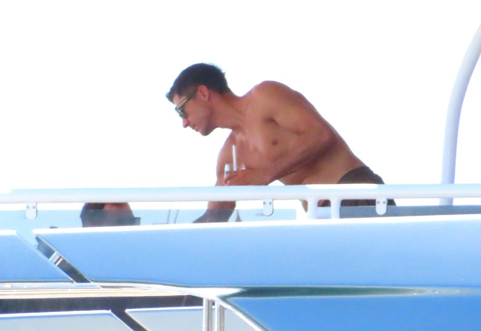 PALMA DE MALLORCA, SPAIN - *EXCLUSIVE* - Amid speculation on his future after announcing he will leave the German giants Bayern Munich, the Polish Striker Robert Lewandowski goes shirtless out on his boat on his summer holidays with wife Anna Lewandowska and the family at Palma De Mallorca, Spain. *UK Clients - Pictures Containing Children Please Pixelate Face Prior To Publication*,Image: 703805754, License: Rights-managed, Restrictions: RIGHTS: WORLDWIDE EXCEPT IN SPAIN, Model Release: no, Pictured: Robert Lewandowski, Credit line: BACKGRID / Backgrid UK / Forum