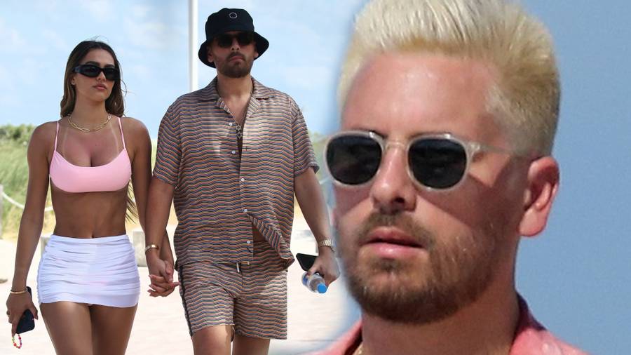 Scott Disick z dziewczyną na basenie.