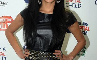 Skórzana mini, kozaki za kolano… (FOTO)