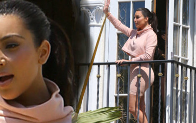 Kim Kardashian niczym królowa pozdrawia fanów z balkonu