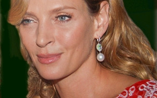 Umy Thurman buziaczki z projektantami (FOTO)