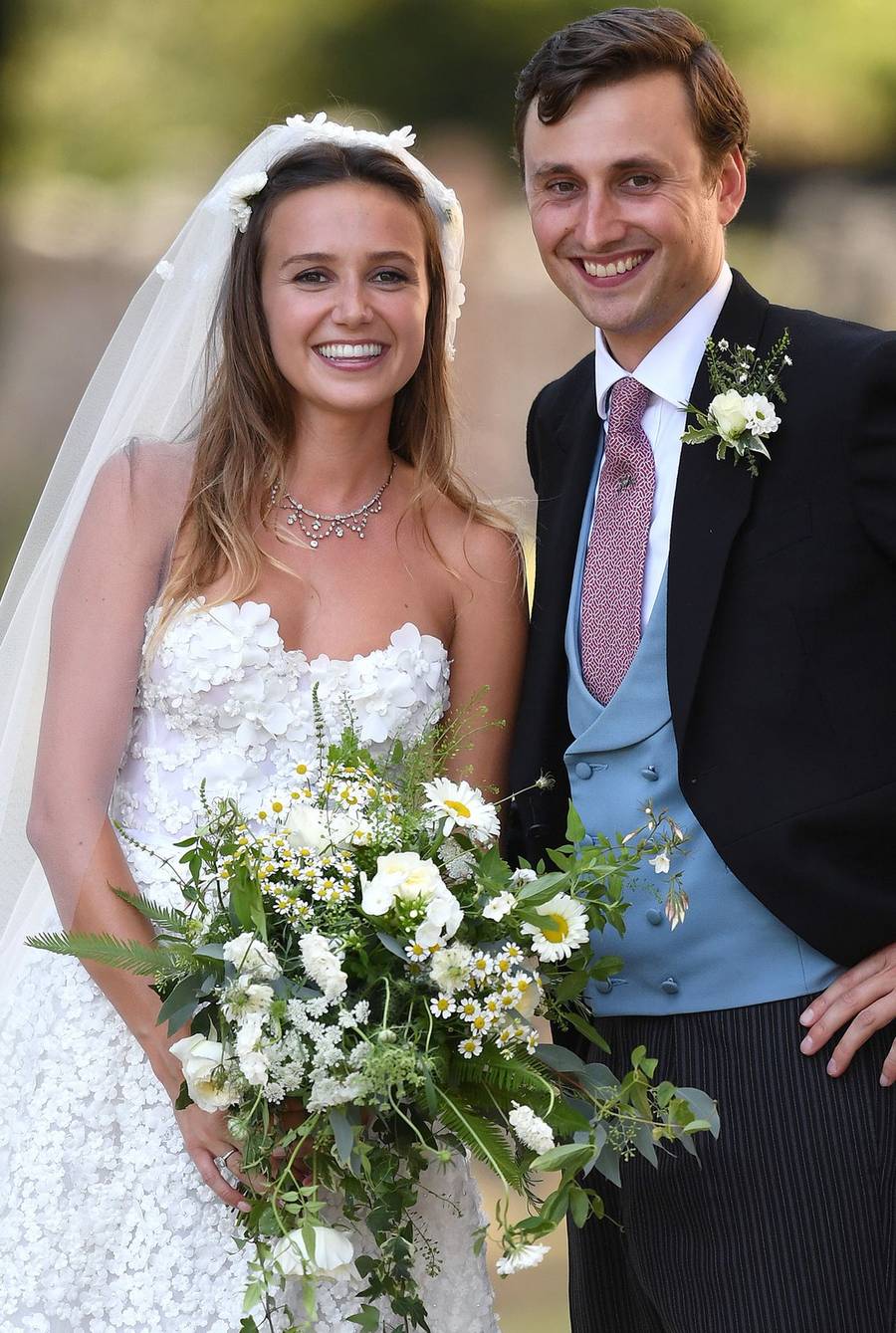 Księżna Meghan z księciem Harrym na ślubie Charliego van Straubenzee i Daisy Jenks