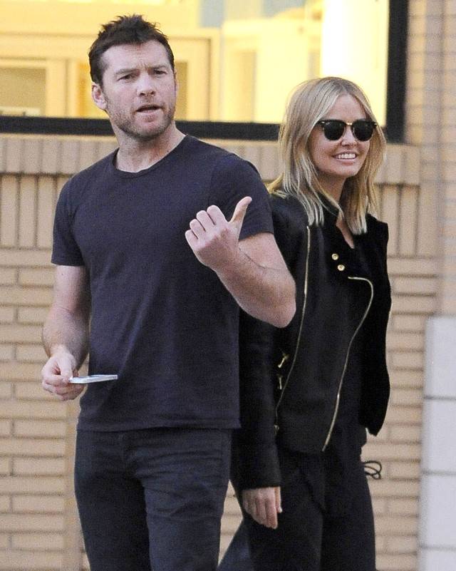Sam Worthington na zakupach z dziewczyną, Larą Bingle