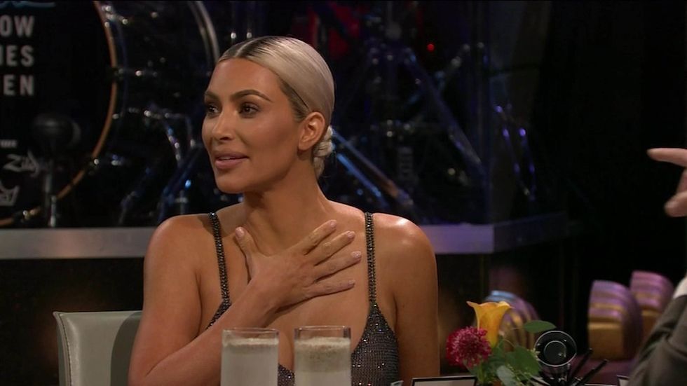 ** RIGHTS: WORLDWIDE EXCEPT IN UNITED STATES ** Los Angeles, CA - Kim Kardashian drinks a sardine smoothie to avoid question about 'pregnant' sisters Kylie and Khloe on Spill Your Guts or Fill Yours Guts with James Corden. The reality star was appearing on The Late Late Show to promote her new fragrance when she joined host Corden for the game where they have to answer personal questions or eat or drink nasty food items if they refuse. Kim was up first and was asked by Corden to rank her siblings and mother from best to worst dressed. Kim avoided drinking bird saliva as she didn't hesitate as she named Kendall the best followed by momager Kris. She then switched back and forth between Kourtney and Kylie for third and fourth place before placing Khloe last. Corden was then left eating a scorpion after he refused to name the celebrity who had been the 'biggest jerk' on the show. Kim then avoided eating bull penis as she easily answered what Kanye's worst habit was that she wants him to stop doing - which she admitted was falling asleep everywhere from Pictured: Kim Kardashian, James Corden BACKGRID UK 16 NOVEMBER 2017,Image: 355487860, License: Rights-managed, Restrictions: , Model Release: no, Pictured: Kim Kardashian, James Corden, Credit line: CBS / BACKGRID / Backgrid UK / Forum