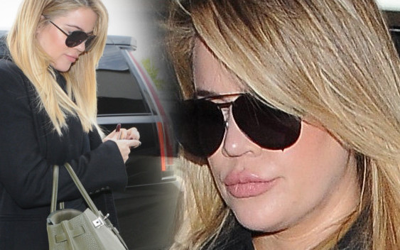 Khloe Kardashian ukrywa ciążowy brzuszek pod płaszczem. Kwitnie?