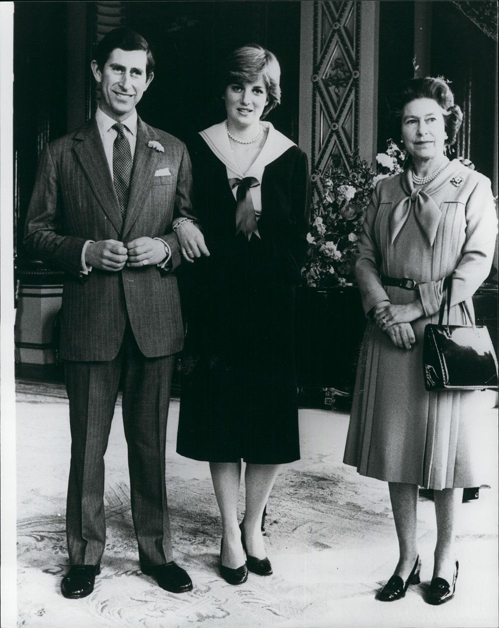 Królowa Elżbieta II z Lady Dianą i księciem Karolem